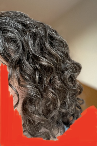 What do I need to de-fluff curly hair?