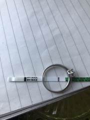 Am worried. Very faint line, 2 days late.