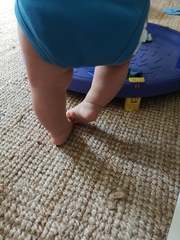8 month old crossing legs when standing. (pics)