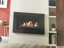 Hole in the wall gas fire height. Advice please.