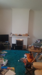 Who do I get to help me sort out / decorate/ organise  my front room ?  Interior designer?