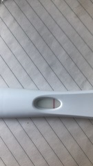 Am worried. Very faint line, 2 days late.