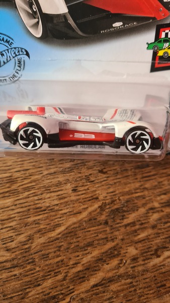 Do you think acrylic paint will cover the white bits of this toy car?