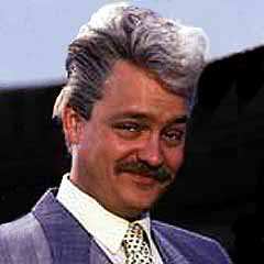 Who does a young, moustachioed Tony Jacklin remind me of?
