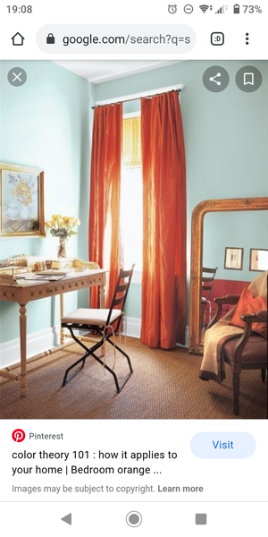 What colour with burned orange chair?
