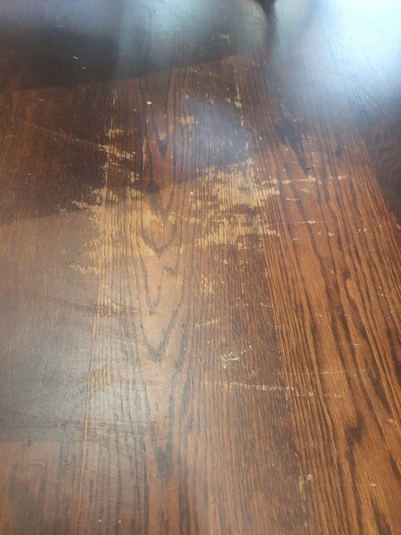 Stained wooden floor getting scratched, what to do?