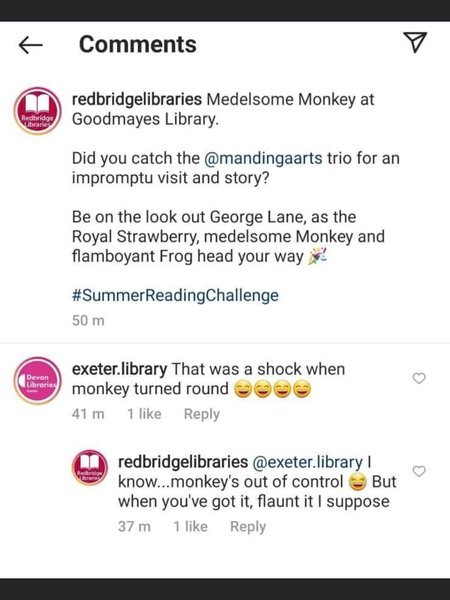 Obscene costumed volunteers handing out summer reading at Redbridge library