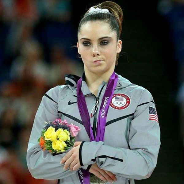 Why did the England players put medals on and then take them off?