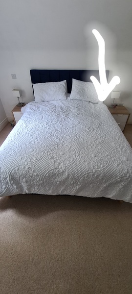 White bedding does not look like a hospital bed!