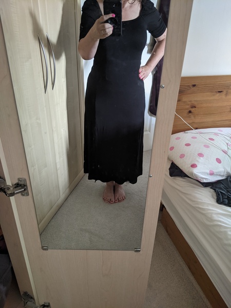 Similar dress but with thicker material to hide the lumps and bumps