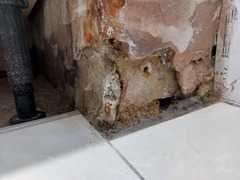Mysteriois damp patch -  leak or something coming through the floor?