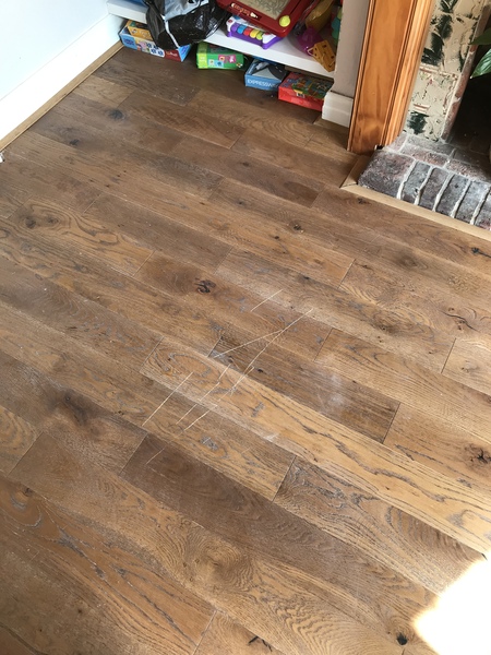 Hardwood flooring totally ruined by tradesman