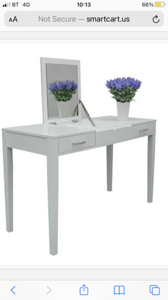 Dressing table with lift up mirror
