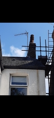 Damp patch on wall. Roof work hasn't helped