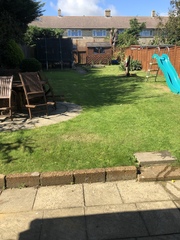 Neighbours have raised their garden and now overlooks ours!