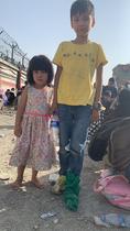 Little girl handed over to US soldiers