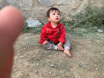 Little girl handed over to US soldiers