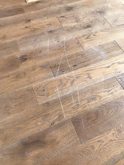 Hardwood flooring totally ruined by tradesman