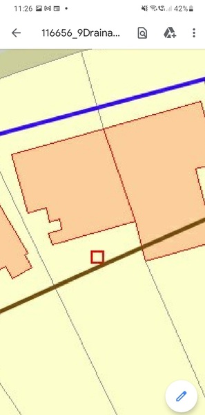 Survey has shown public drain at rear of property