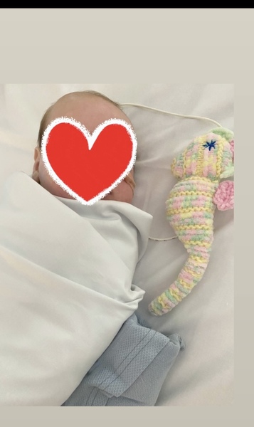 Tiny DS in hospital with bronchiolitis - hand hold