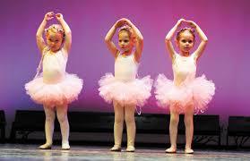 Will white tights and a pink dress make me look like a child?