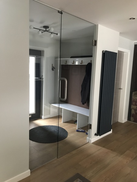 glass partition between lounge and kitchen