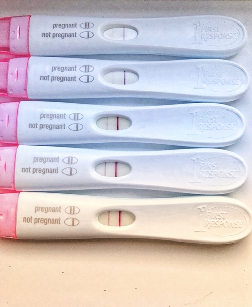 Very low Beta and spotting after BFP - is it over ?