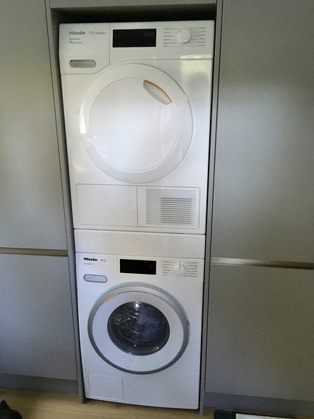 Stacking tumble dryer on top of washing machine