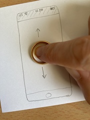 Indulge me please! If you're wearing a ring, take it off, put it on your phone, and try to scroll with your finger in it.