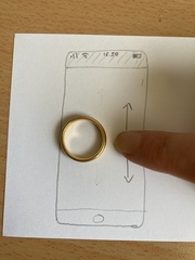 Indulge me please! If you're wearing a ring, take it off, put it on your phone, and try to scroll with your finger in it.
