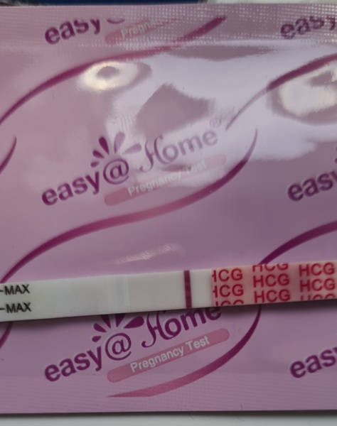 10dpo and virtually no symptoms - am I out?