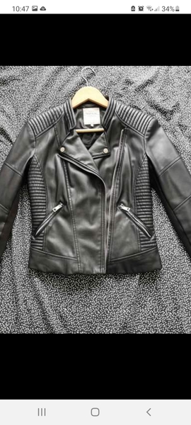 Can anyone pull off a black leather jacket?