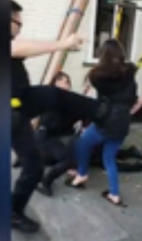 Policeman kicks 15 year old girl in the stomach