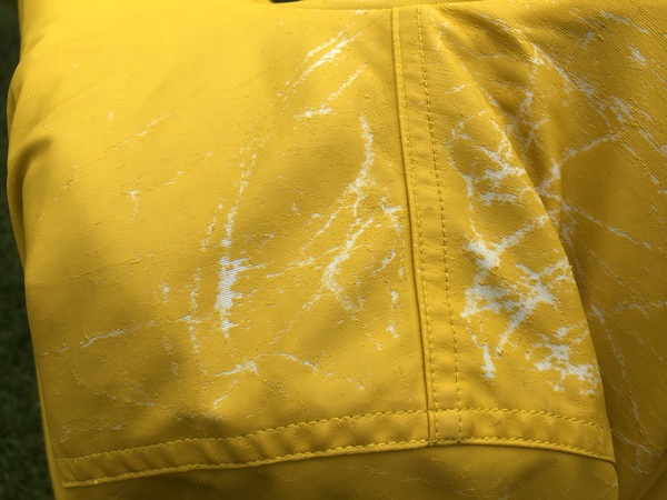 How do I fix my damaged petit bateau raincoat?