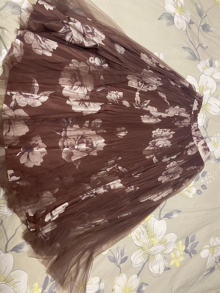 What kind of top would you wear with this skirt?