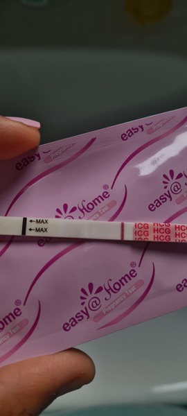 10dpo and virtually no symptoms - am I out?