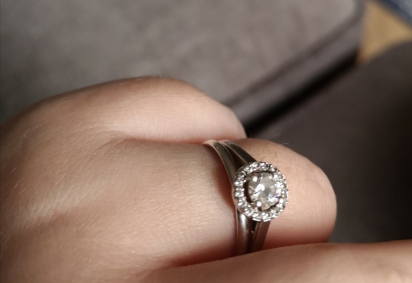To show me your engagement rings?
