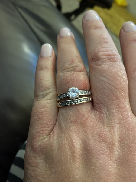 To show me your engagement rings?