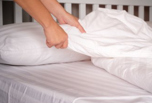 Red stain on bed sheet?