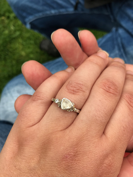 To show me your engagement rings?
