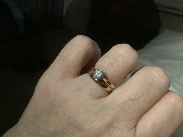 To show me your engagement rings?