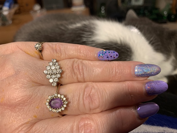 To show me your engagement rings?