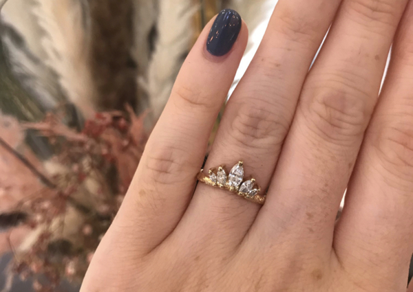 To show me your engagement rings?