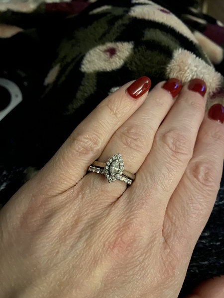 To show me your engagement rings?