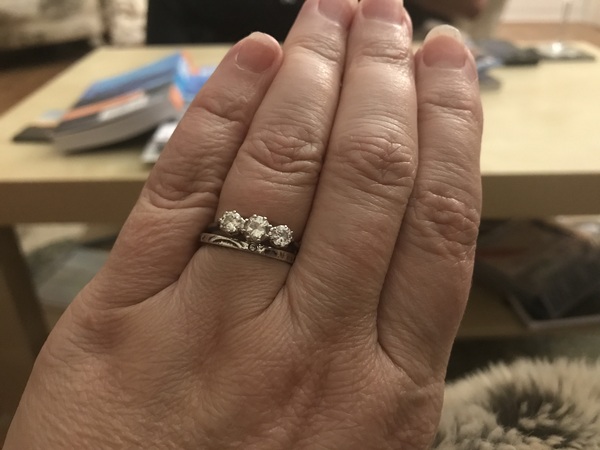 To show me your engagement rings?
