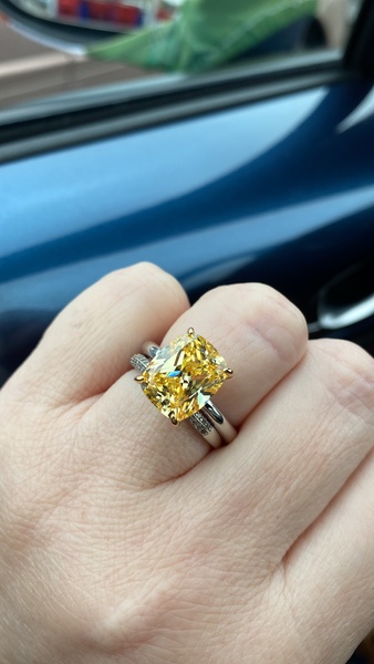 To show me your engagement rings?