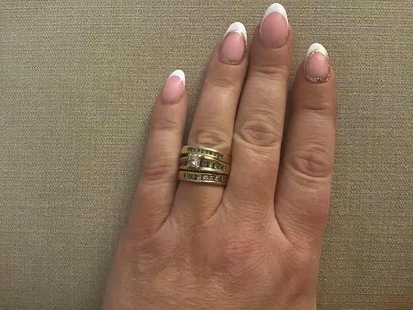 To show me your engagement rings?