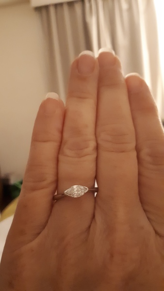 To show me your engagement rings?
