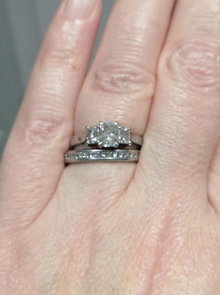 To show me your engagement rings?