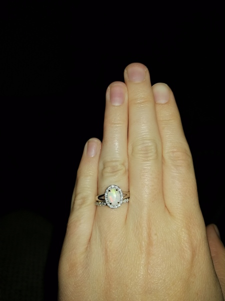 To show me your engagement rings?